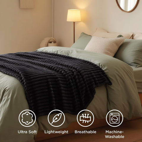Bedsure blanket next to pillow illustrating Twin XL scale and proportion
