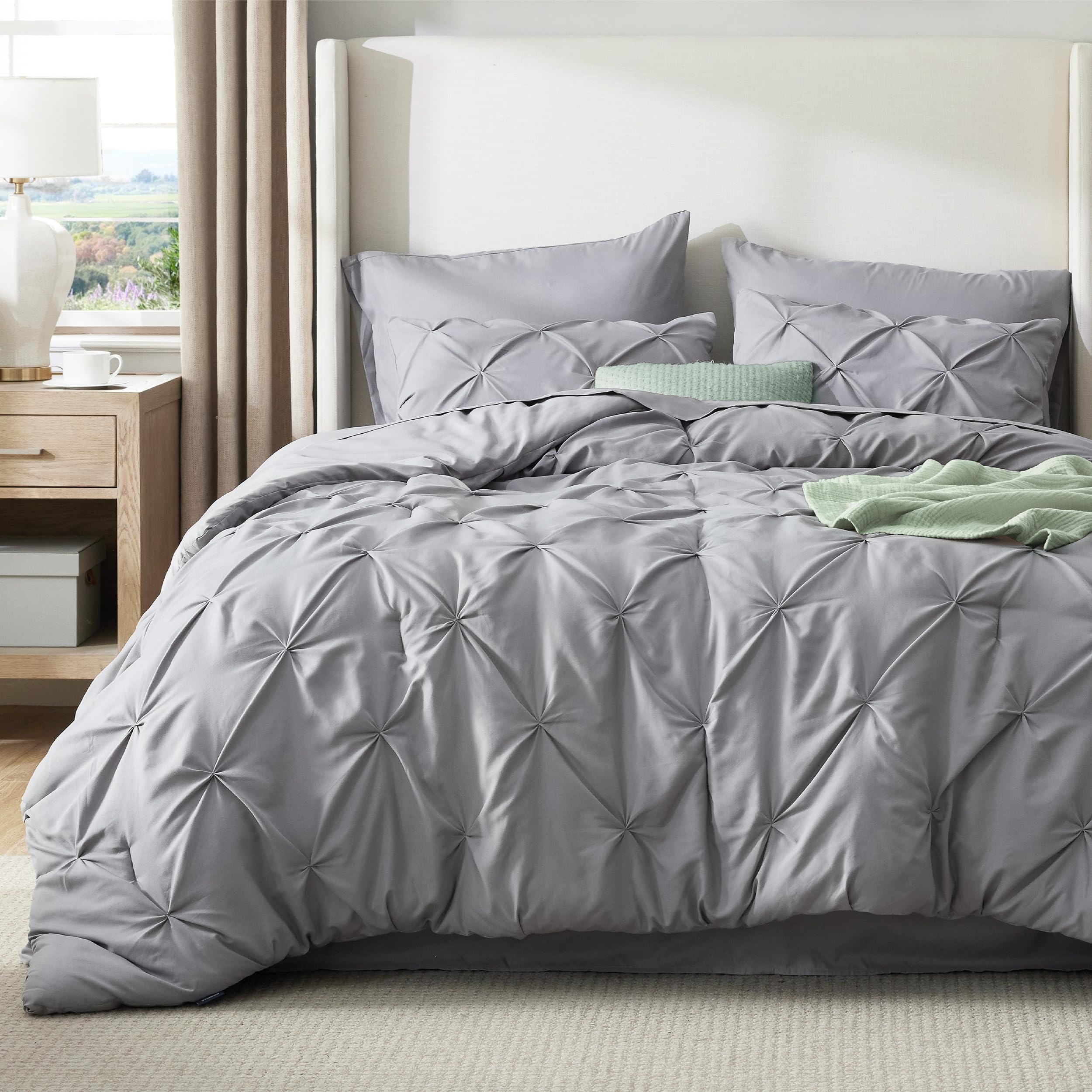 Bedsure set on king mattress showing oversized coverage and drape