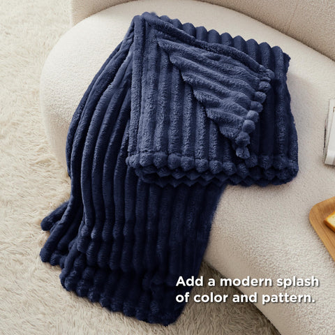 Bedsure blanket on armchair showing 50x70 scale for everyday comfort