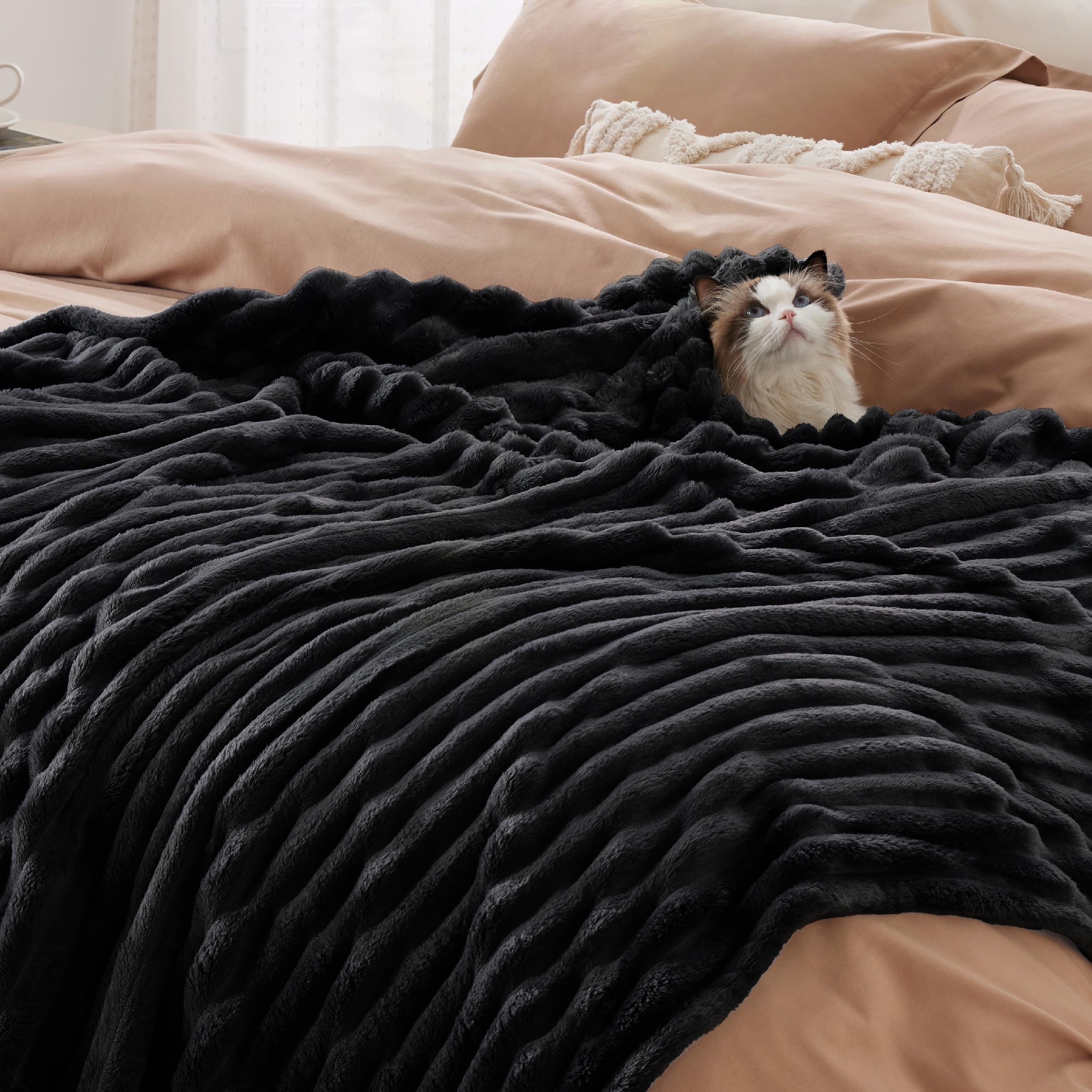 Bedsure spread on bed demonstrates lightweight layering without bulk