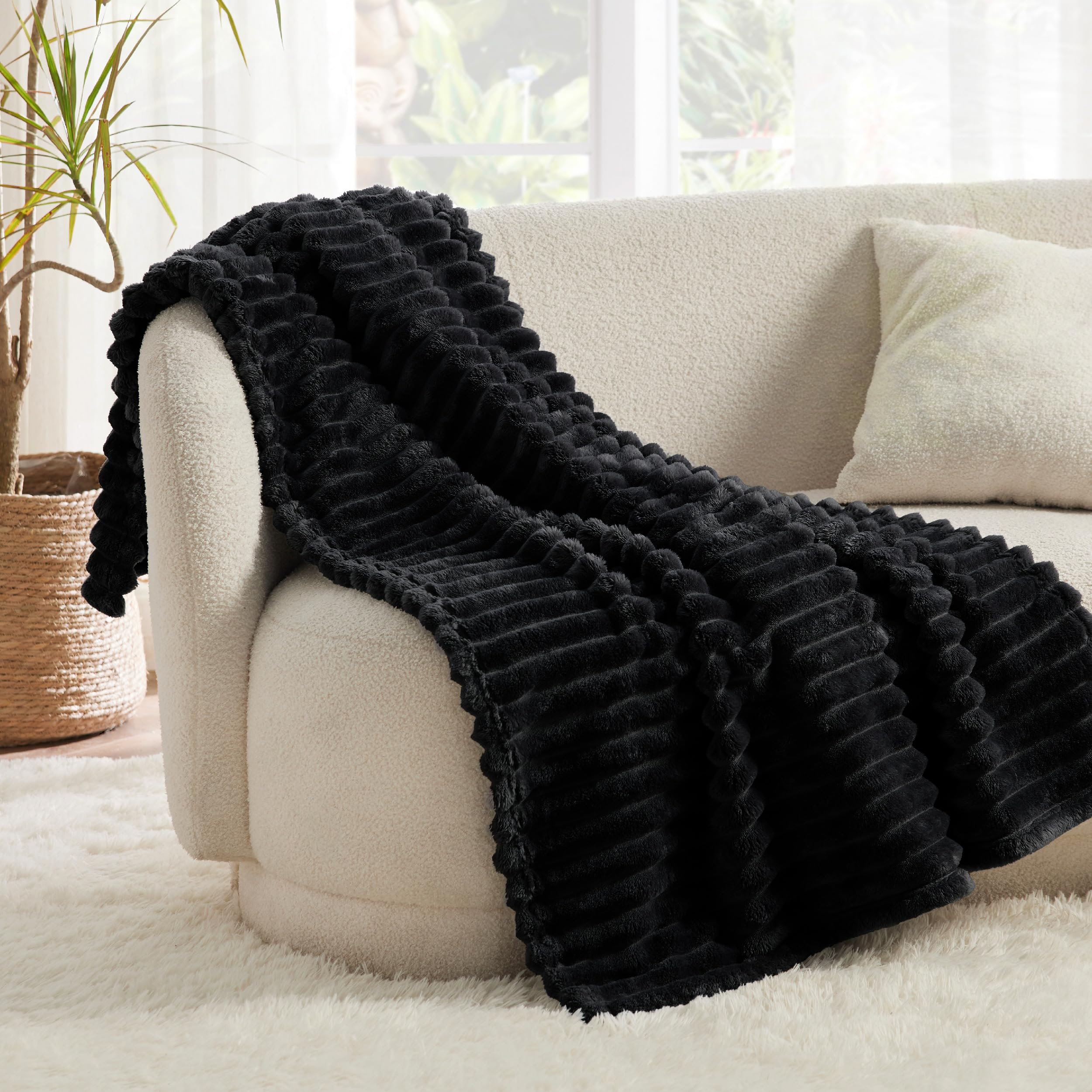 Bedsure folded throw on shelf highlights neat storage and quick access