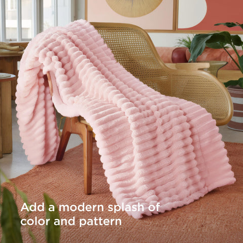 Bedsure folded throw on shelf highlighting lightweight, neat storage