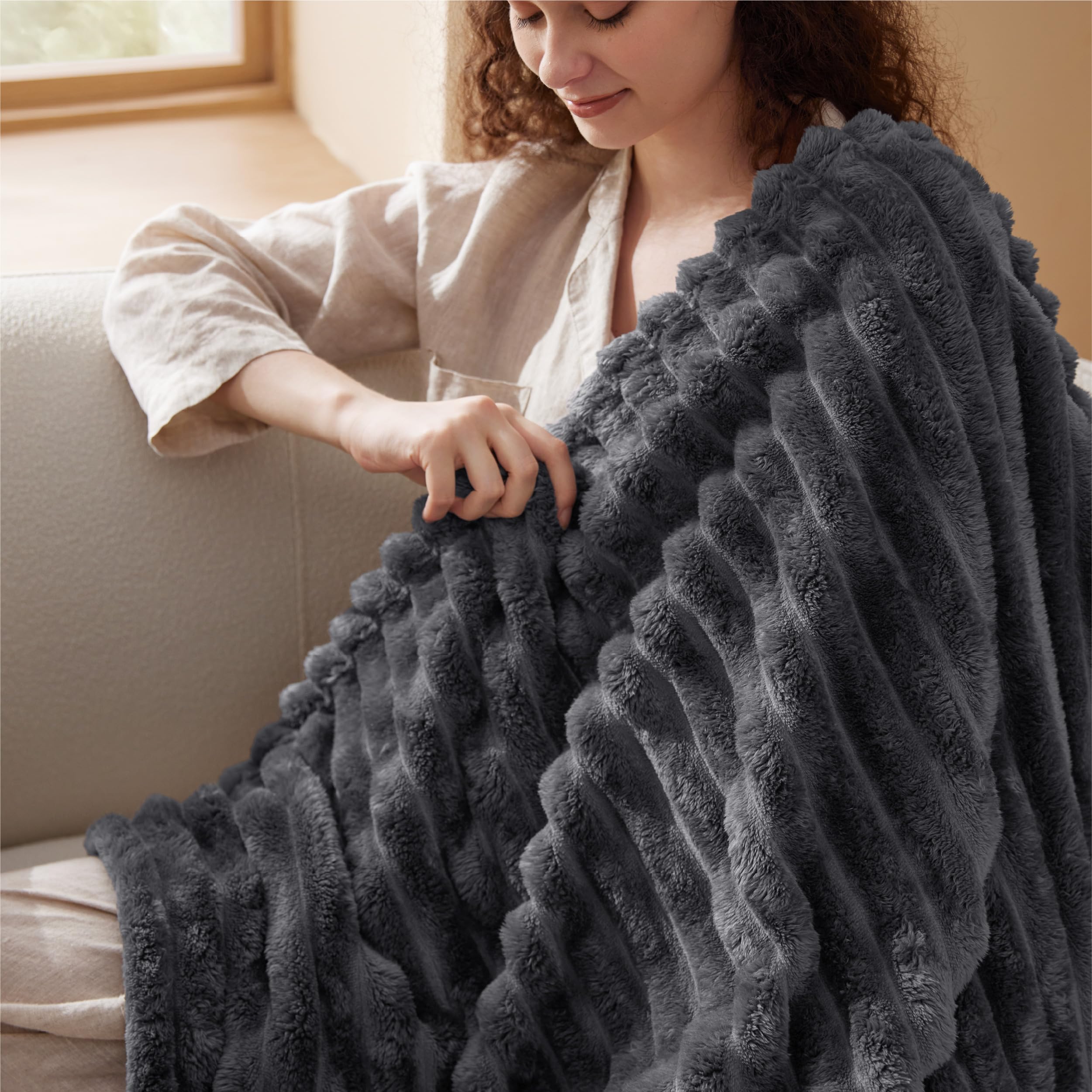 Bedsure throw wrapped around person demonstrating warmth and snug feel