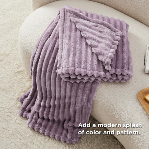 Bedsure throw draped on bed showing lightweight warmth and layered look