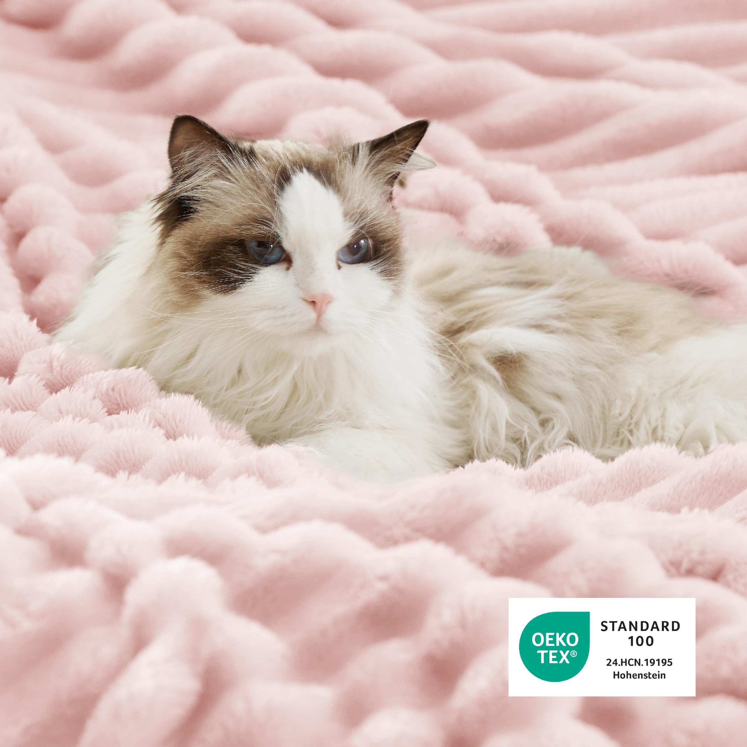Bedsure blanket styled on bed illustrating twin 60x80 fit and layered appeal