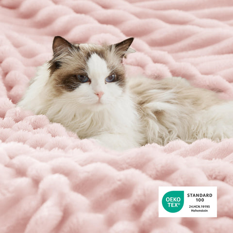 Bedsure blanket styled on bed illustrating twin 60x80 fit and layered appeal