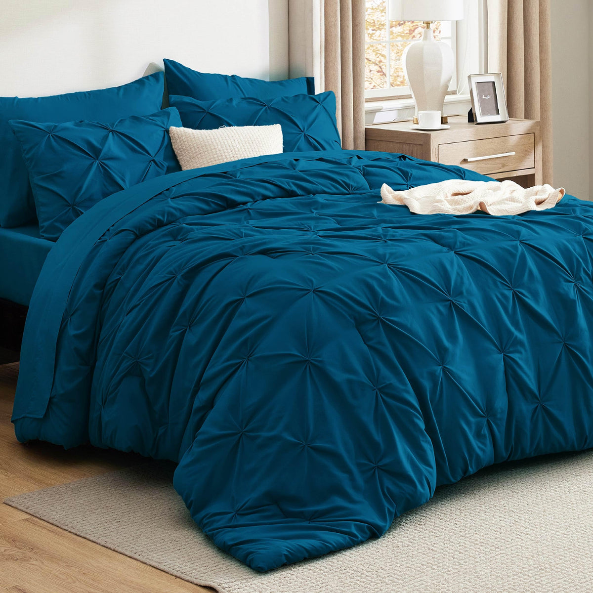 Bedsure comforter front view showing teal color and tailored finish for elegant bedding