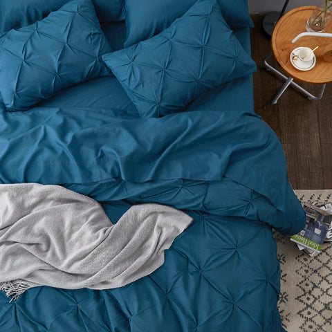 Bedsure comforter on California King bed demonstrating full coverage and drape