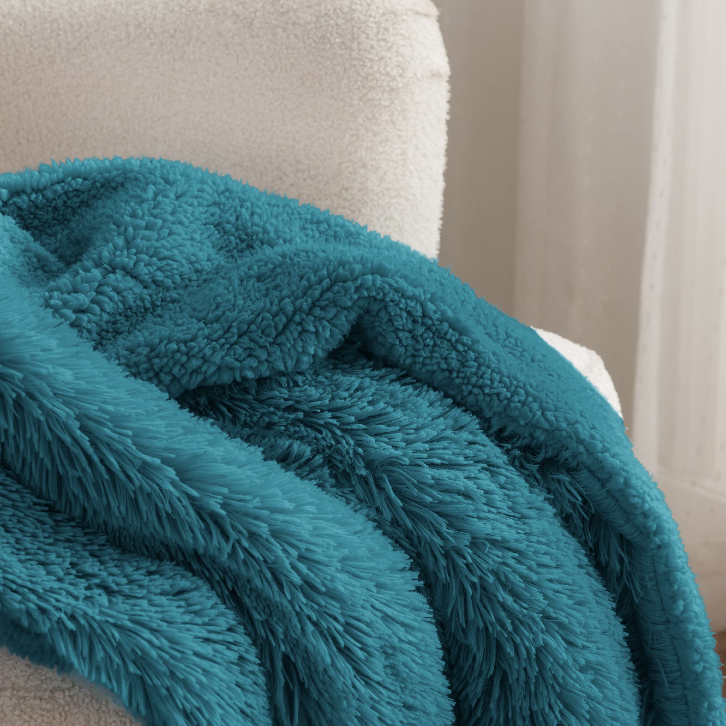 Bedsure draped on sofa showing stylish accent and cozy lounging benefit
