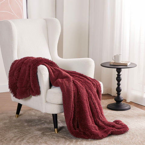 Bedsure blanket on chair showing 50x60 size scale