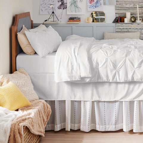 Bedsure folded pillows and comforter edge highlighting brushed microfiber for quiet, cozy sleep