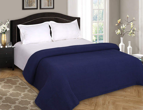 Belizzi Home blanket spread on a twin bed providing comfortable coverage and easy layering