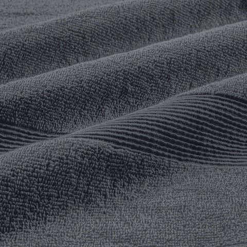 Belizzi Home close-up of ring-spun looped cotton texture, highlights plush absorbency