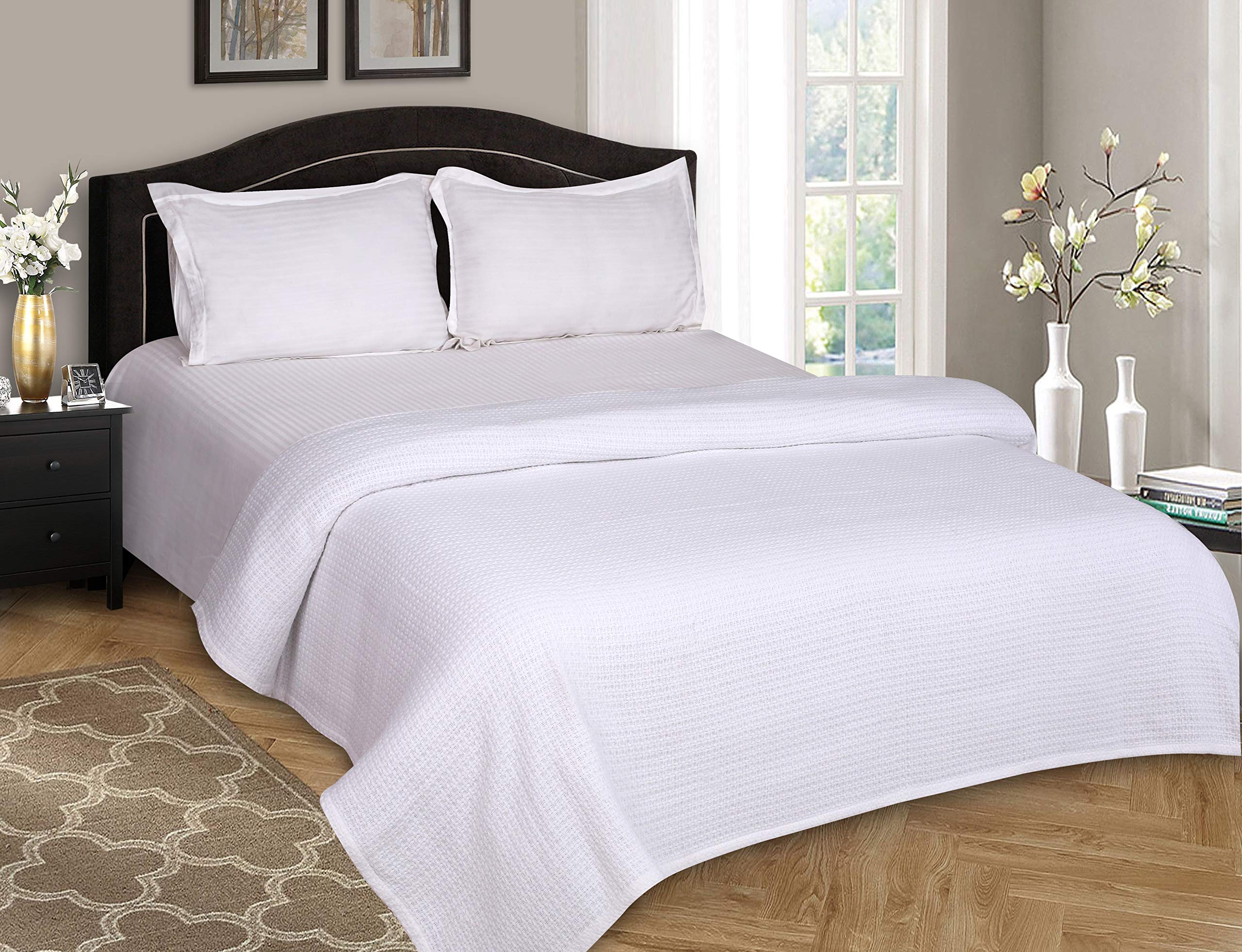 Belizzi Home blanket draped over bed demonstrating generous king-size coverage