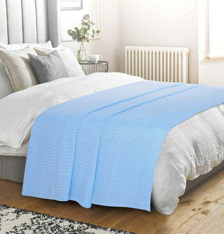 Belizzi Home folded blanket displaying size and easy-storage benefit