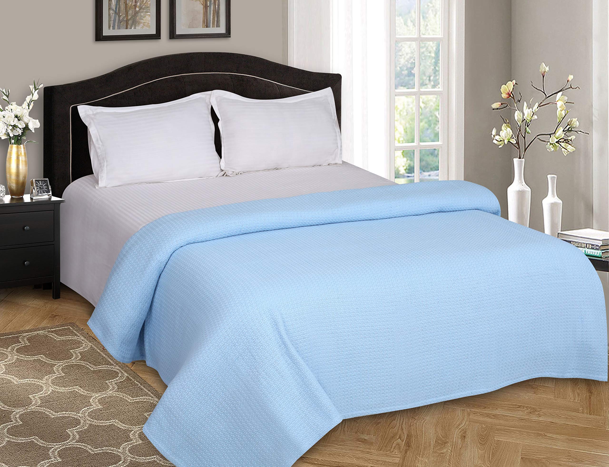 Belizzi Home blanket on full/queen bed showing generous coverage benefit