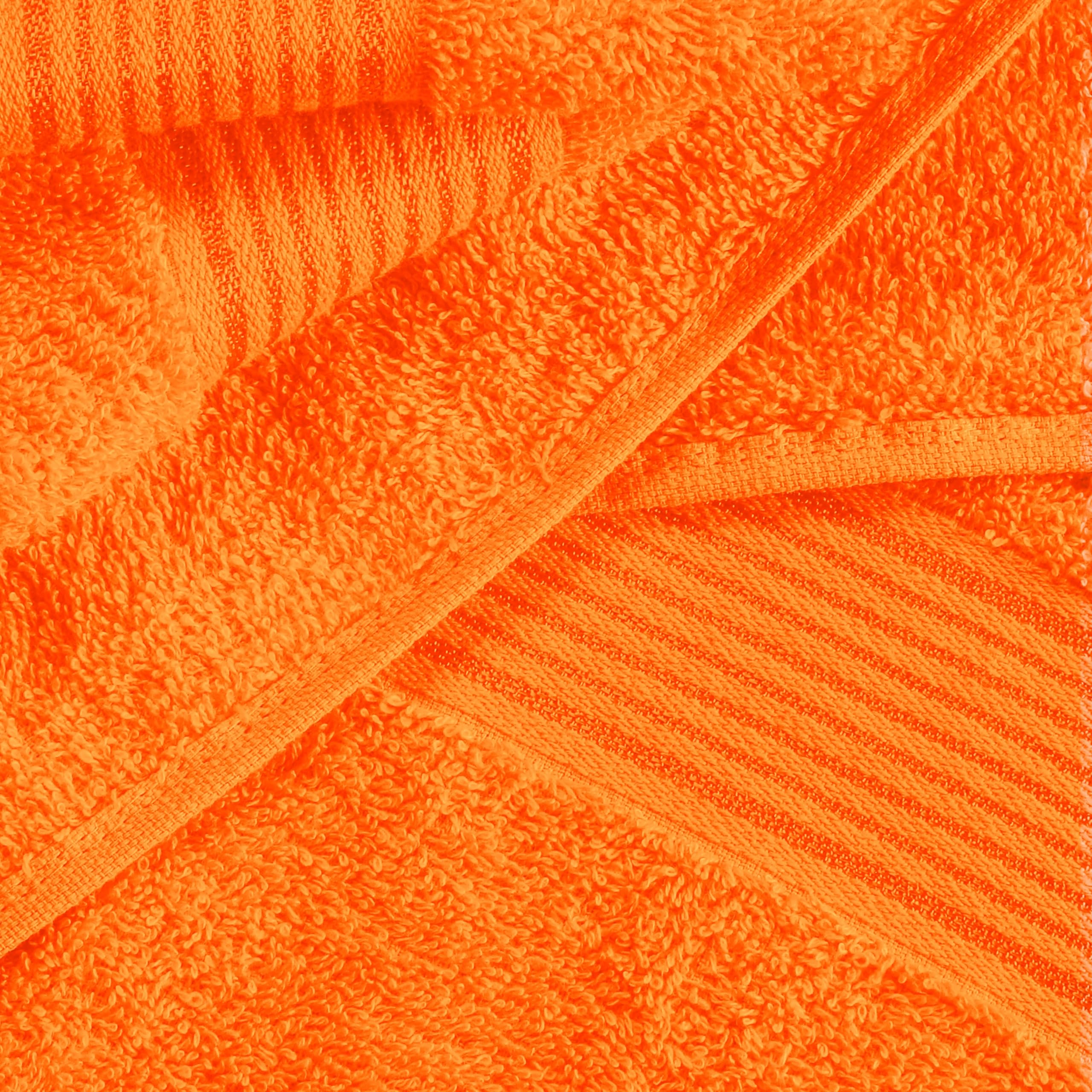 Belizzi Home folded oversized bath towel in orange highlighting size and soft appearance for full-body coverage