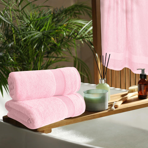 Belizzi Home towel next to faucet showing 27x54 inch scale and full coverage