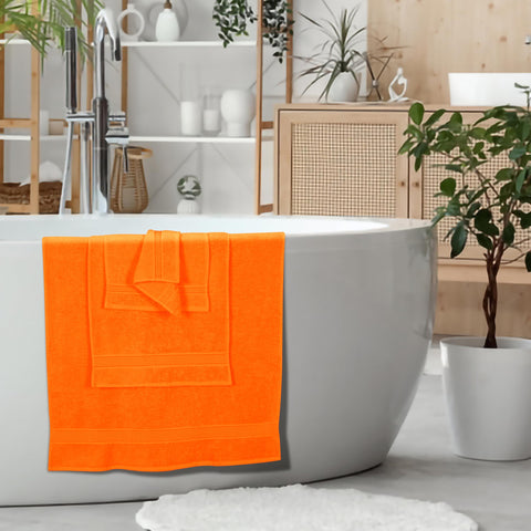 Belizzi Home towels styled in a modern bathroom adding a bright accent and tidy organization