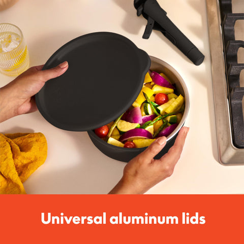 BELLA stacked pans without handles compactly stored to save cabinet and shelf space