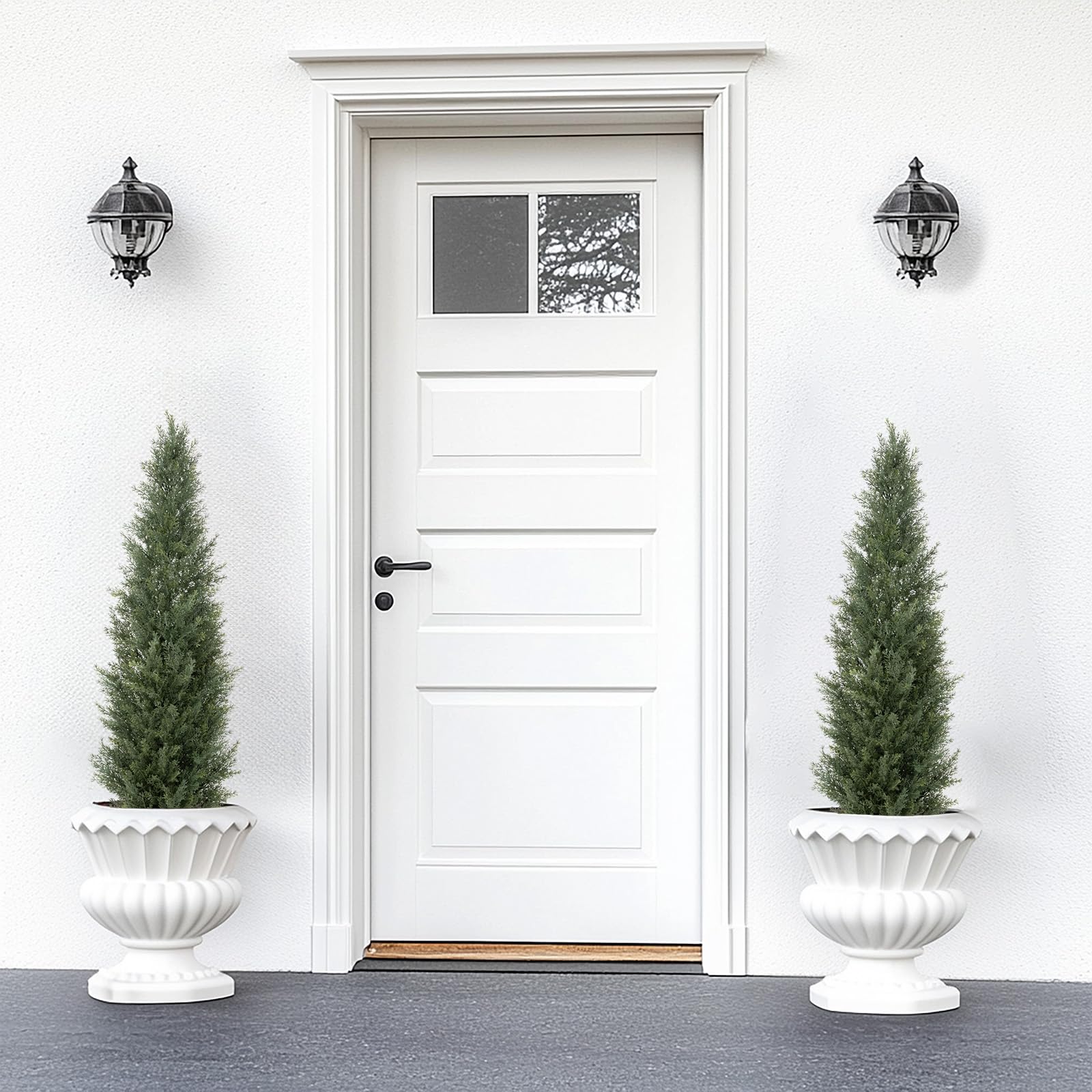 bellacat two topiaries styled on a patio creating balanced outdoor decor