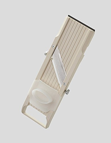 Benriner stainless blades close-up showing fine medium and coarse edges for precise cuts