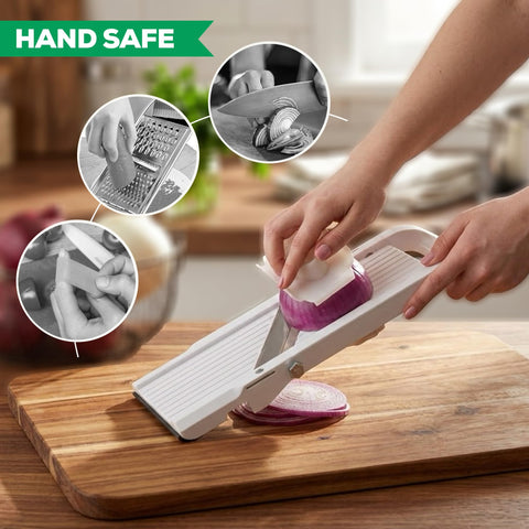 Benriner safety guard holding produce to protect fingers and collect slices