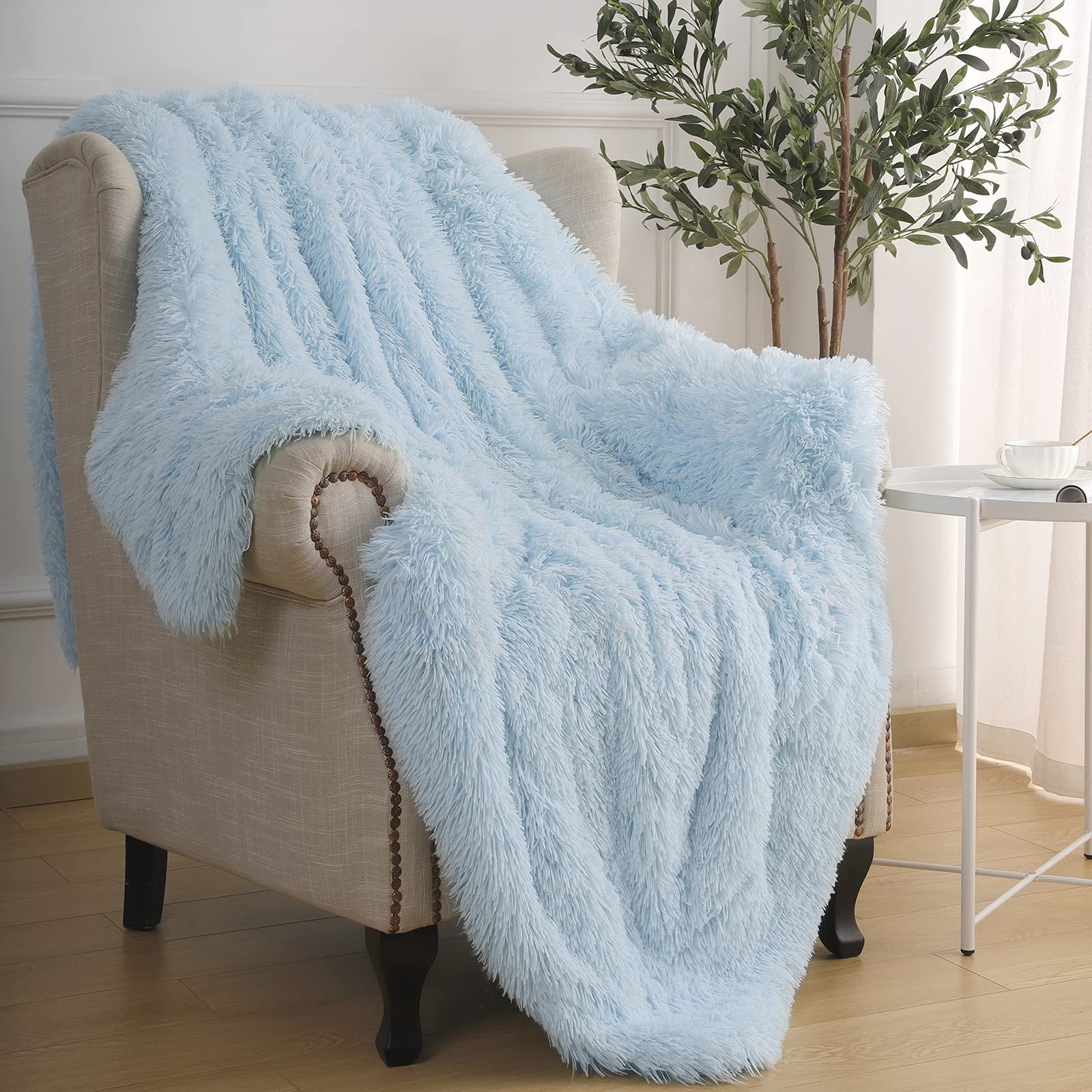 BENRON in use over lap while reading offering portable warmth and softness