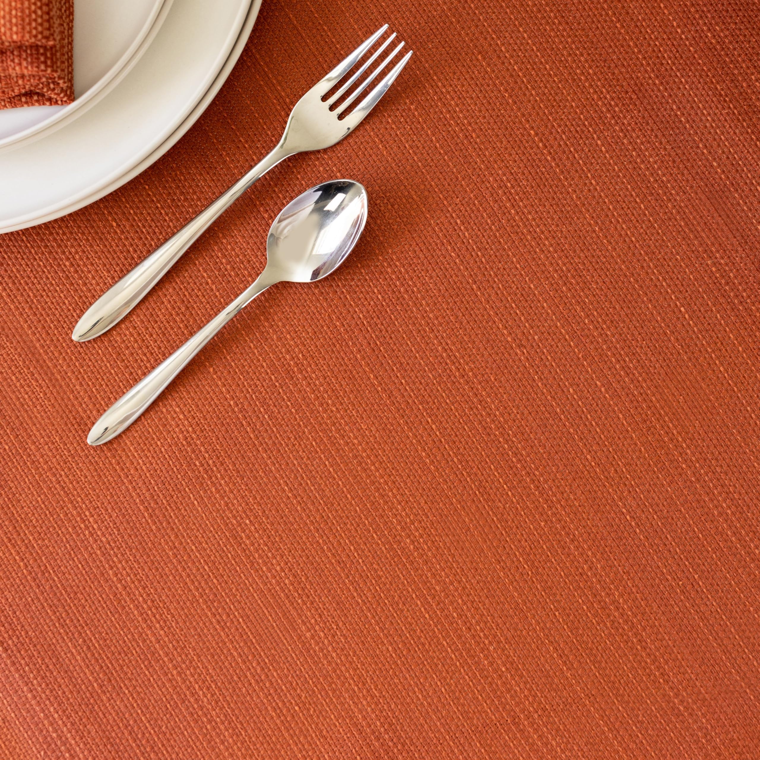 Benson Mills folded tablecloth stacked to show thickness and easy storage benefit