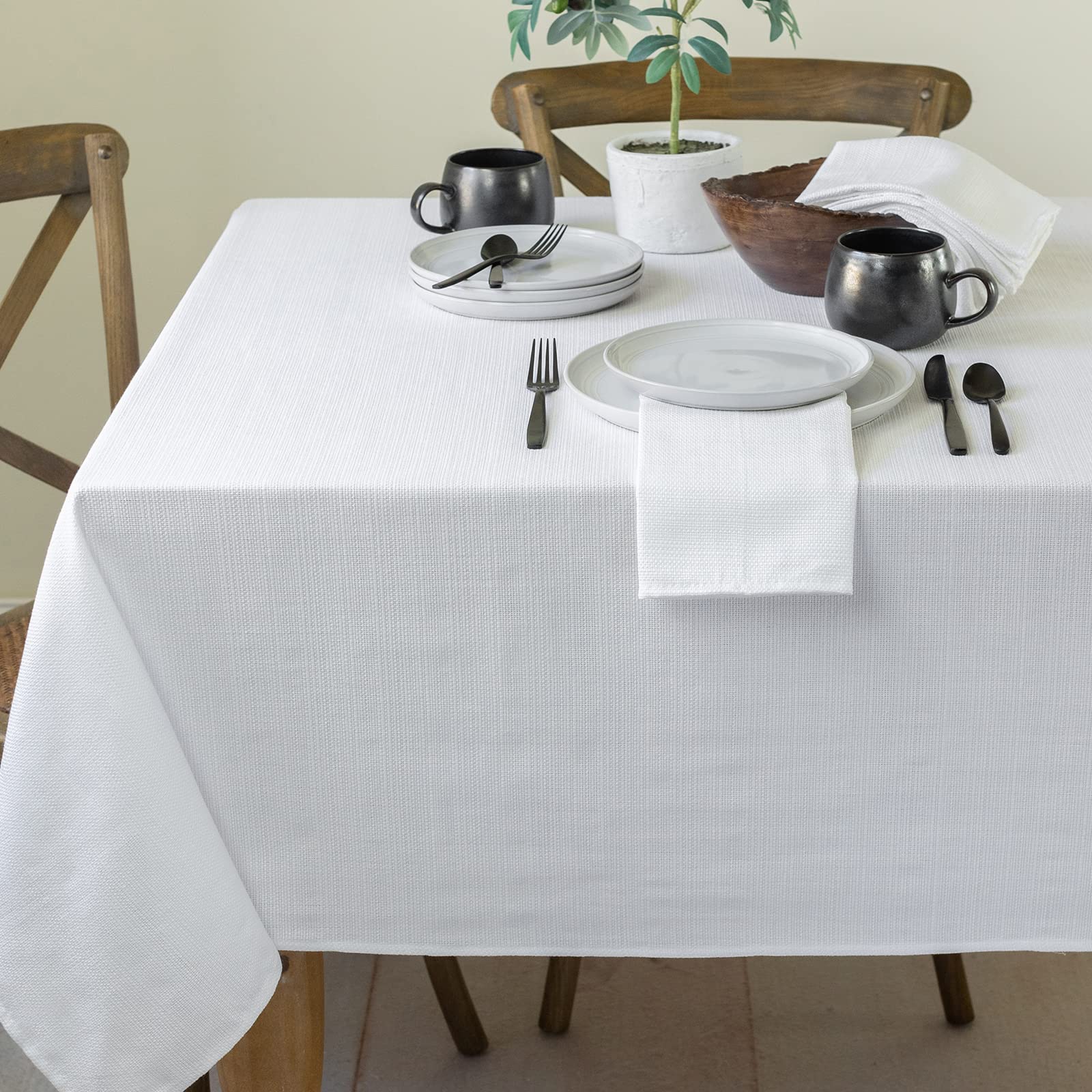 Benson Mills front view of 60x140 white tablecloth showing clean rectangular fit