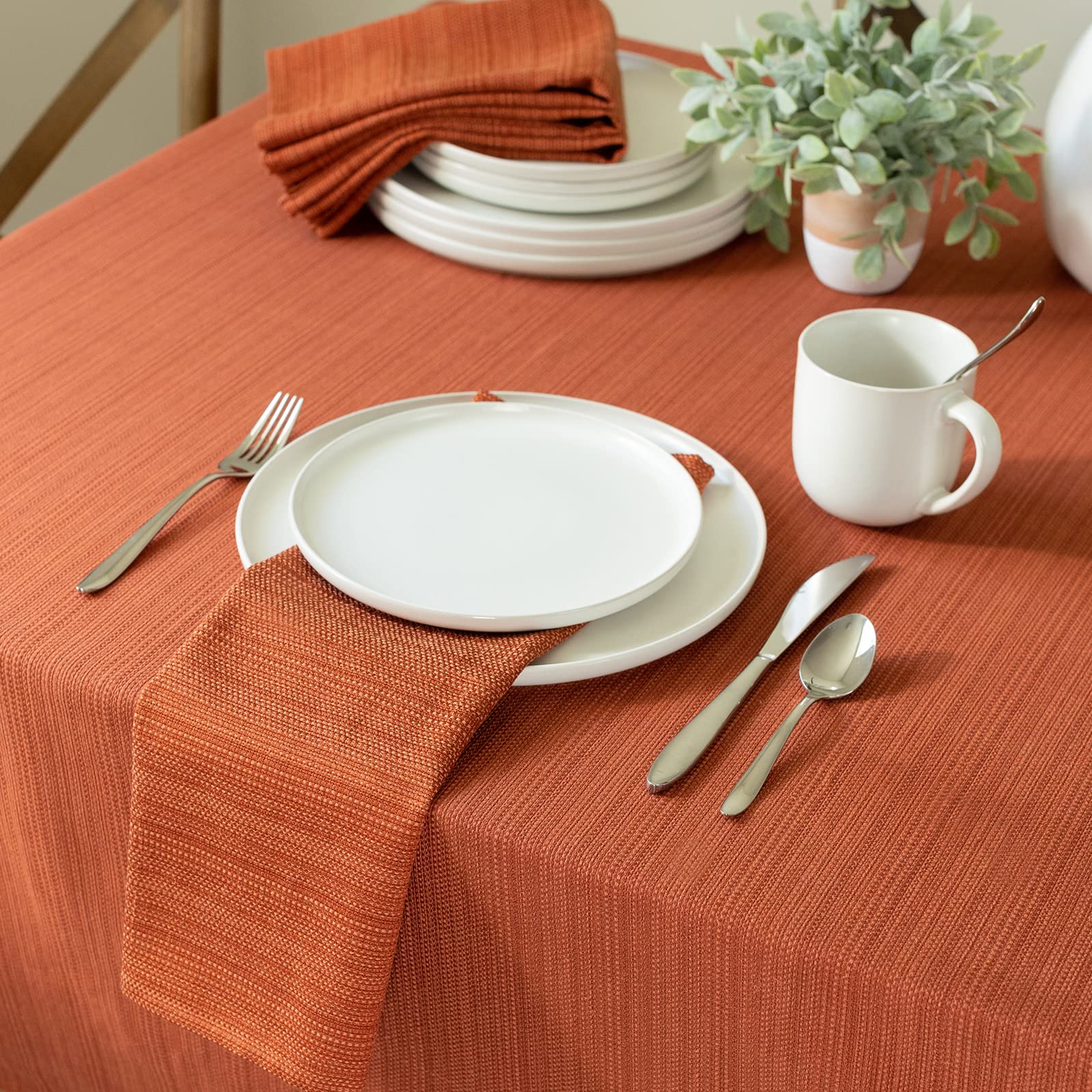 Benson Mills table setting on cloth highlighting coordinated place settings and benefit