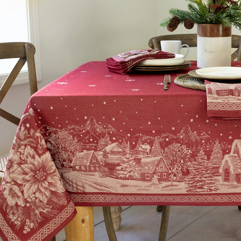 Benson Mills front view of Christmas Story tablecloth showing festive village design and elegant drape