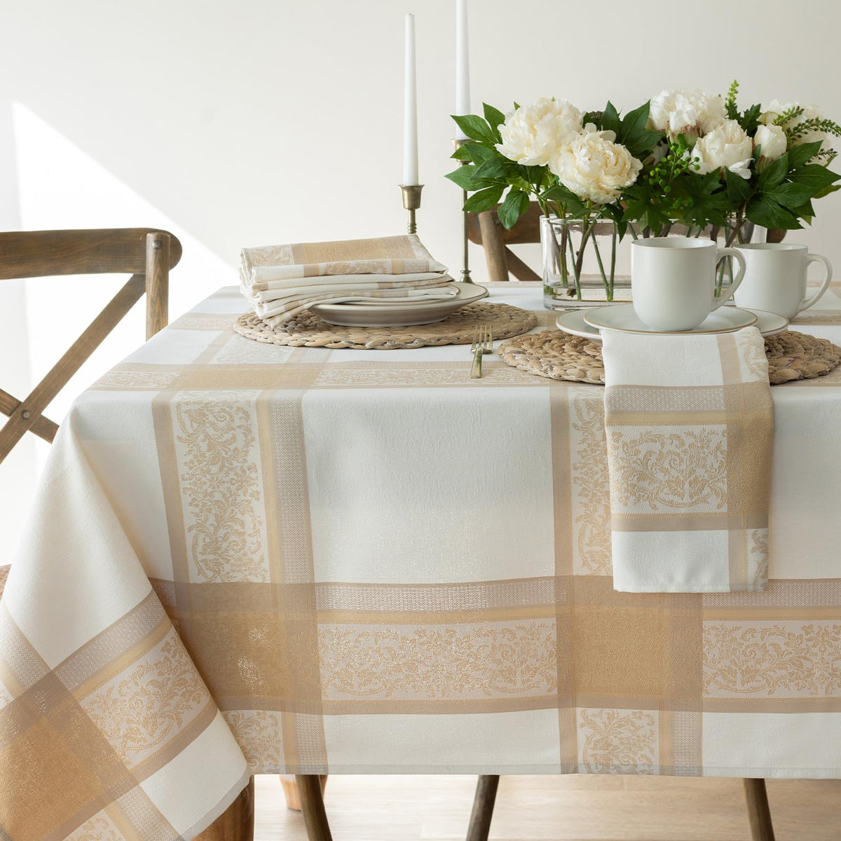 Benson Mills front view of packaging showing Grandeur Glow tablecloth and benefits
