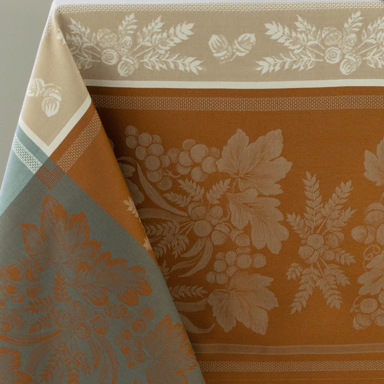 Benson Mills tablecloth on table with plate for size and drop-length comparison