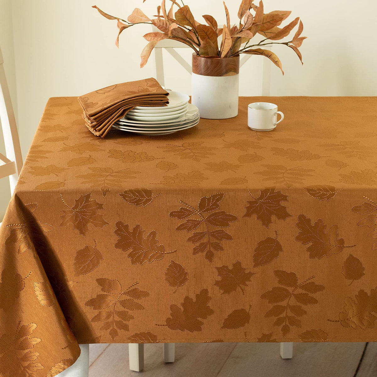 Benson Mills front view of amber-bronze damask tablecloth showing harvest pattern and warmth