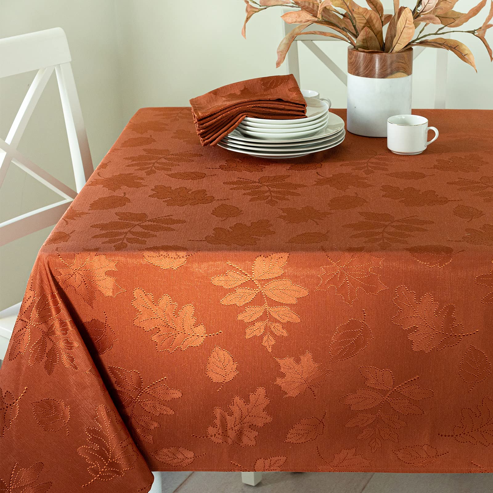 Benson Mills front view of rust damask tablecloth showing autumn motifs and polished look