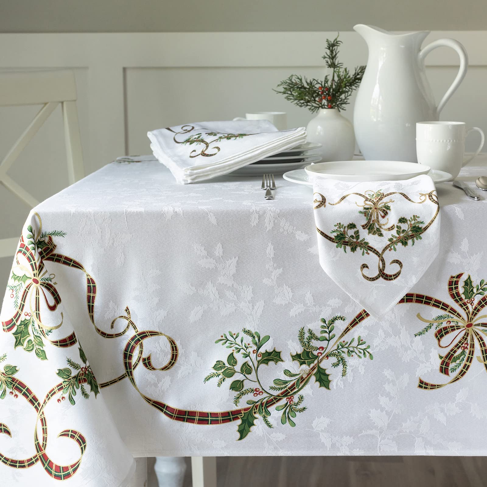 Benson Mills front view of Merry Ribbons tablecloth showing holiday pattern and neat drape