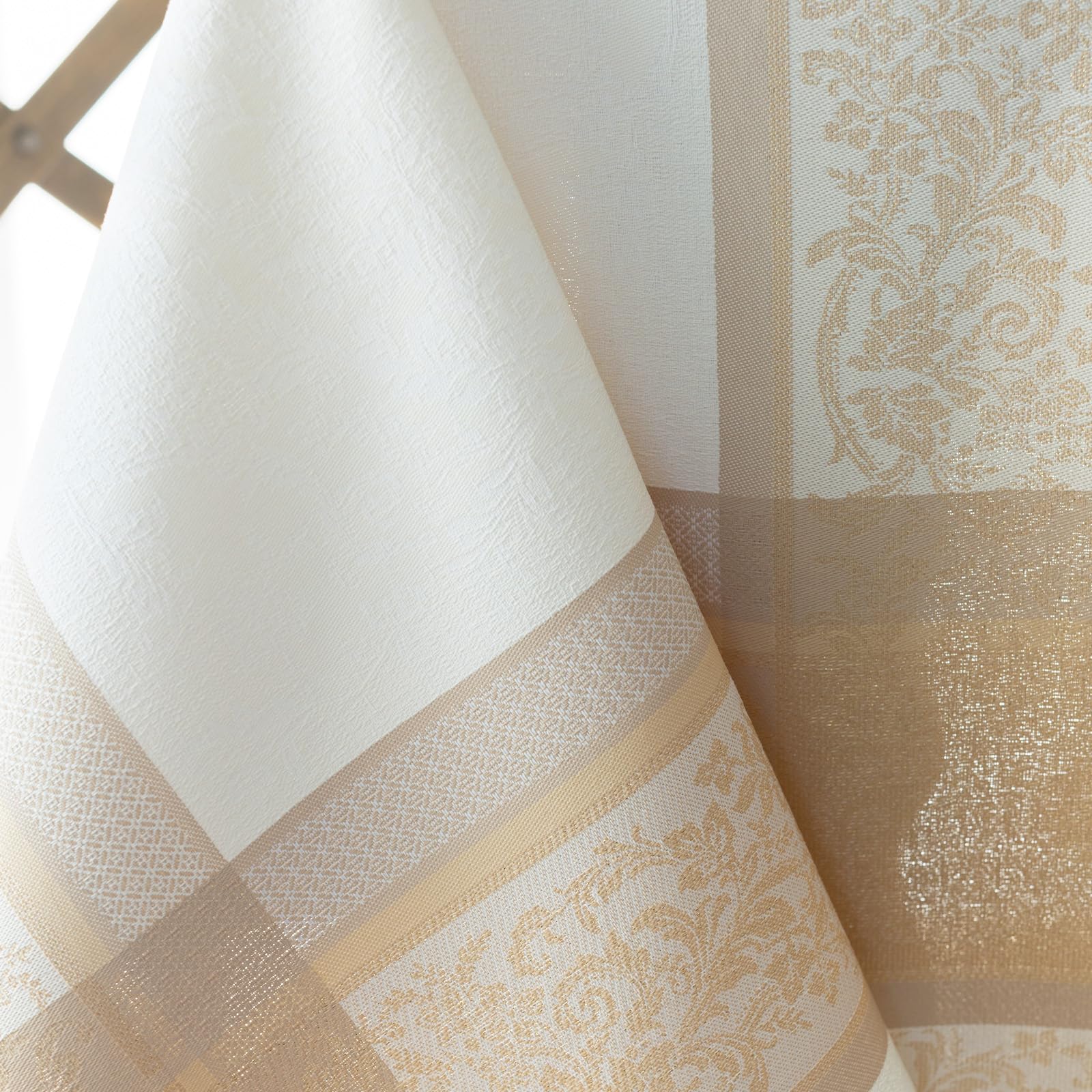 Benson Mills full 60x120 rectangular tablecloth laid out, creates elegant table