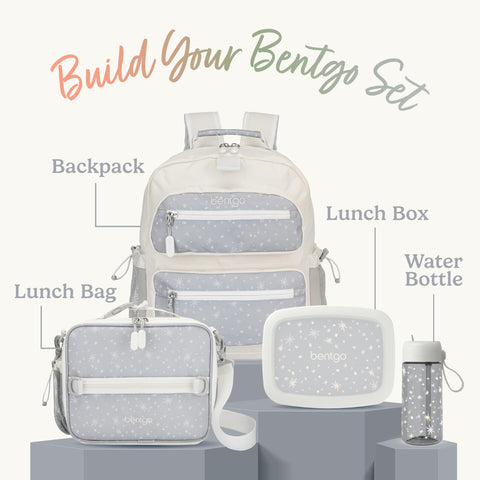 Bentgo lunch bag clipped to a child’s backpack in a school hallway for convenience