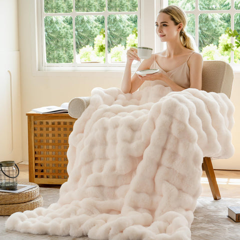 BENVWE folded on sofa showing decorative styling and easy layering benefit