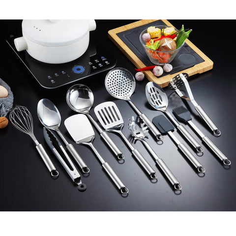 Berglander 13 utensils arranged on wooden surface, quick visual inventory and appeal