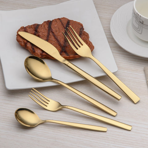 Berglander fork close-up showing polished gold finish and comfortable grip