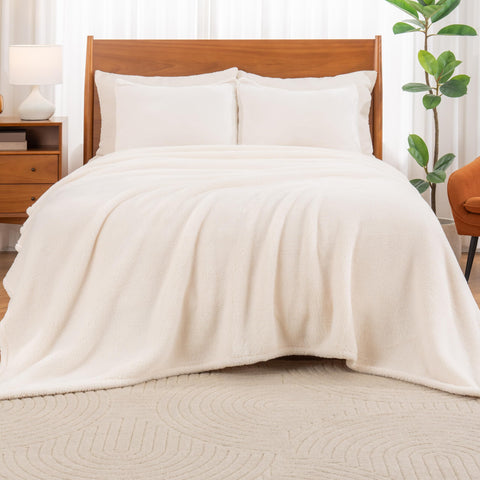 Berkshire Blanket draped over sofa highlighting cozy styling
