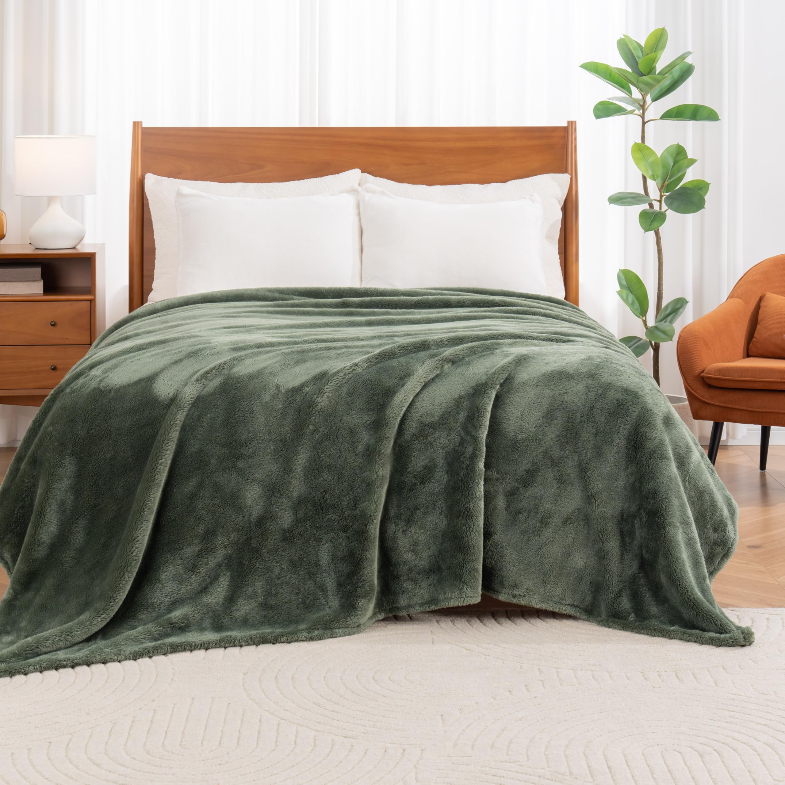 Berkshire Blanket folded on sofa, Berkshire comfort adds cozy seating appeal