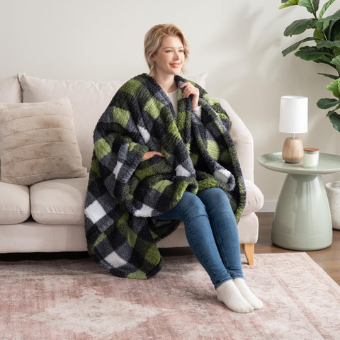 Berkshire Blanket on model in living room showing mobility and comfort