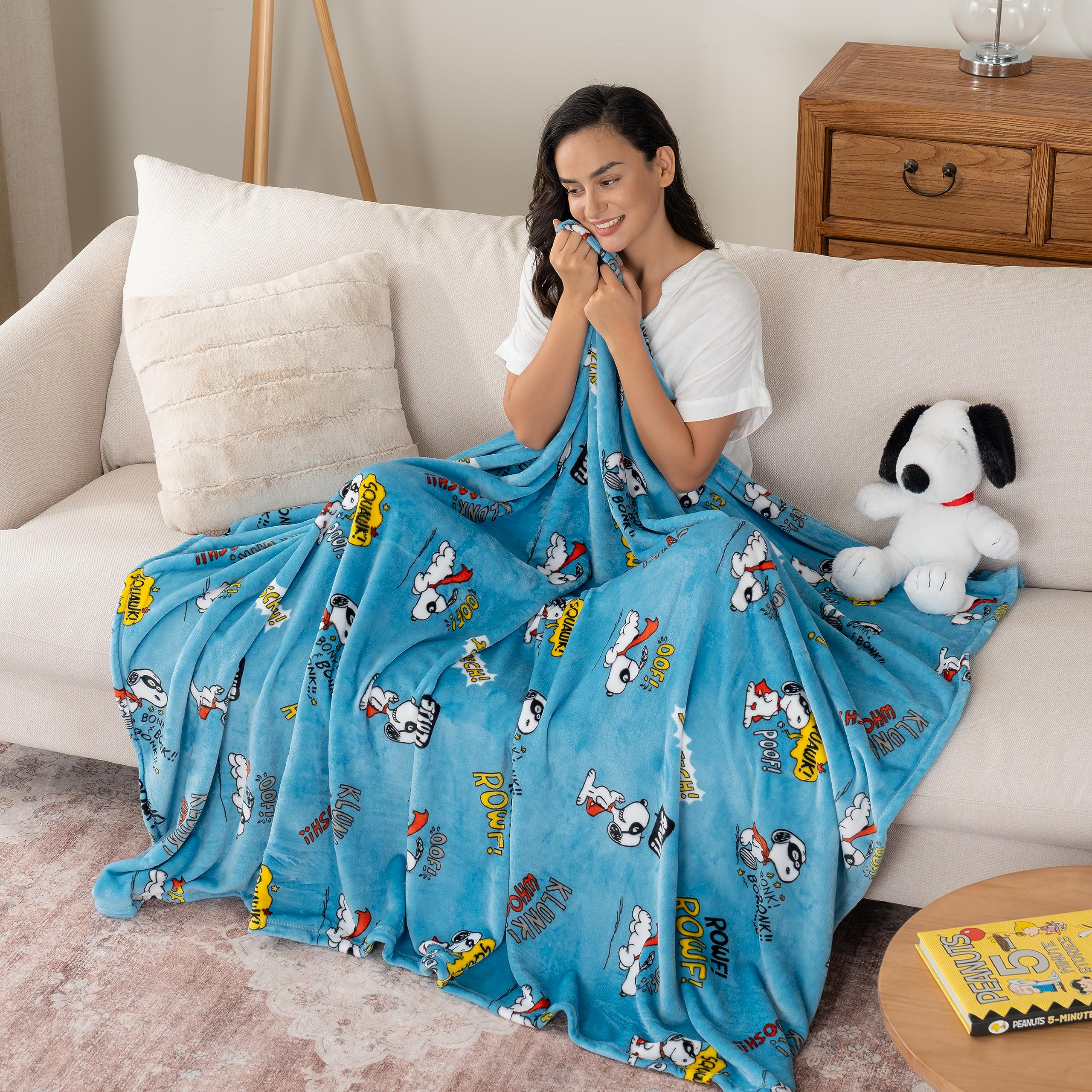Berkshire Blanket draped over couch illustrating cozy living room use and style