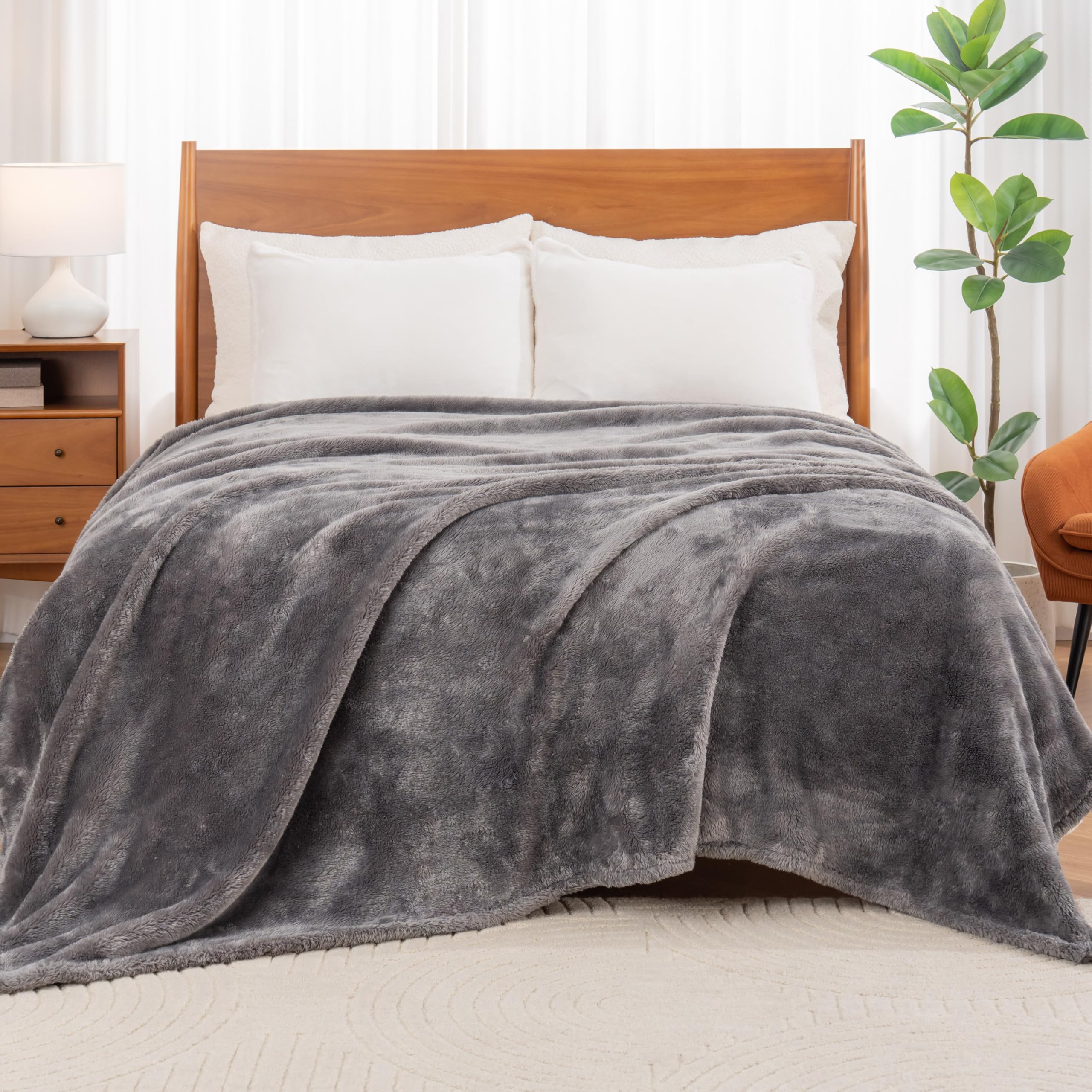 Berkshire Blanket styled on queen bed offering cozy, modern bedroom appeal