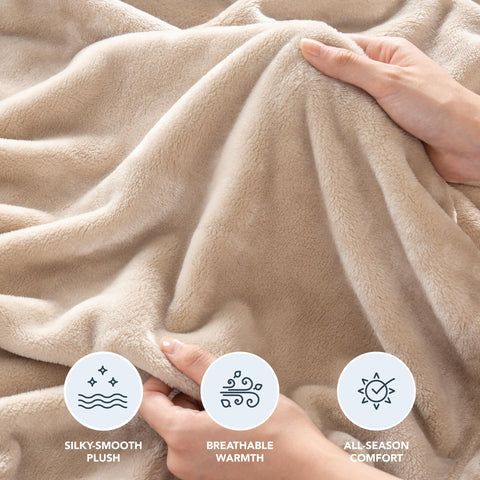 Berkshire Blanket spread on a queen bed demonstrating full coverage and styling