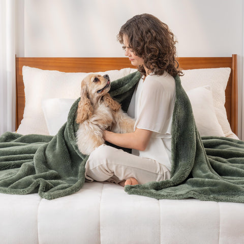 Berkshire Blanket on sectional sofa demonstrating large coverage for gatherings