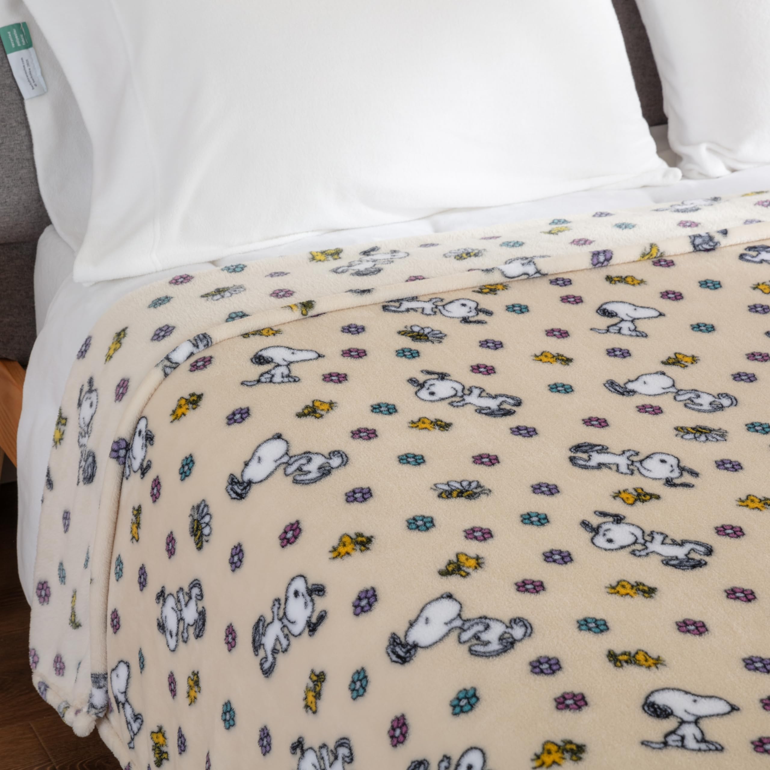 Berkshire Blanket Snoopy close detail of Woodstock print with bright colors